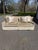 This two seat sofa pairs a tailored silhouette with exceptional comfort. Upholstered in a champagne velveteen fabric and...