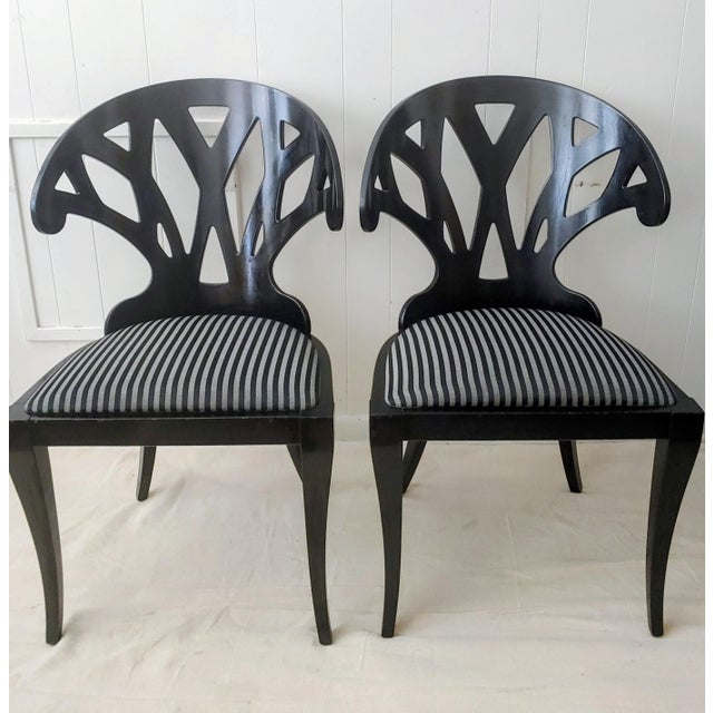 Here's a pair of Postmodernist chairs designed by Pietro Constantini for Ello Furniture circa 1980s. The design is rare...