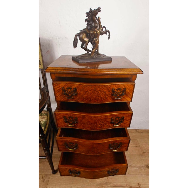 This is a beautiful Early 20th-century serpentine chest of drawers that would add character and charm to a period styled...