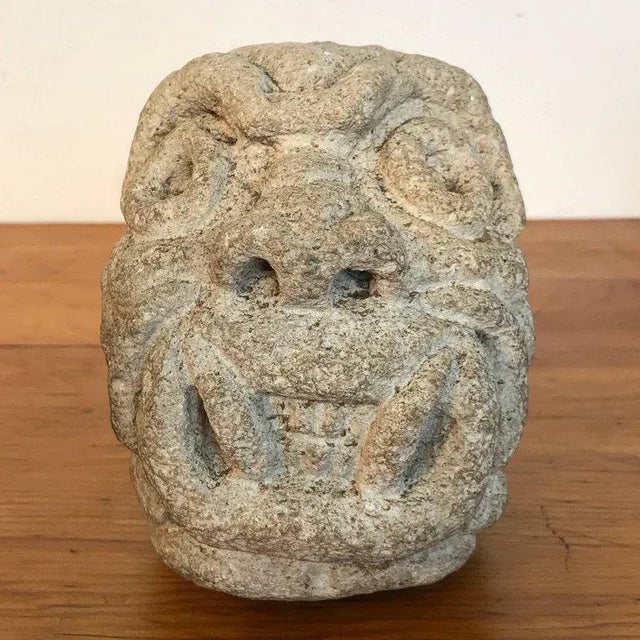 Two carved Mayan deity limestone architectural carvings or / elements, 19th century or older The larger measures 7" W x...