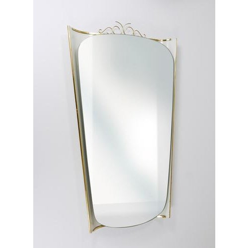 A lovely Italian-style illuminated Midcentury wall mirror from the 1950s, designed by Ernest Igl and crafted by Hillebrand...