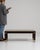 This table makes its impression through dark ebonized wood, fluted with brass cap foot. It was made in France during...