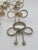 Late 20th Century Late 20th Century Hollywood Regency Gold-Tone Metal Rope Bow Napkin Rings - Set of 8 For Sale - Image 5 of 12