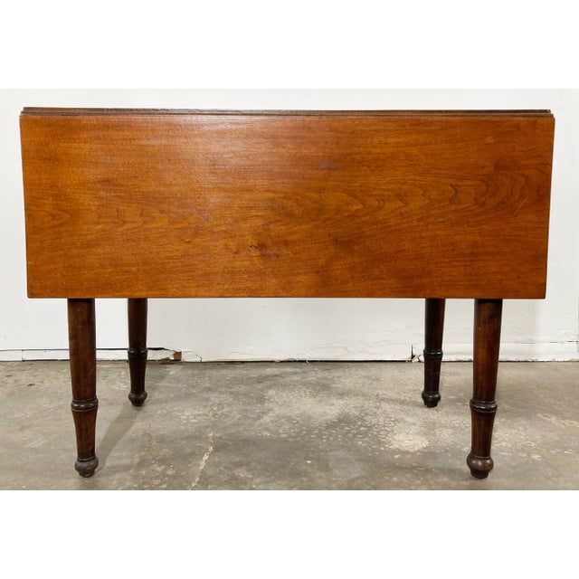 Antique Early American drop leaf wood table with leaves to open for support to full size. Features beautiful aged patina...