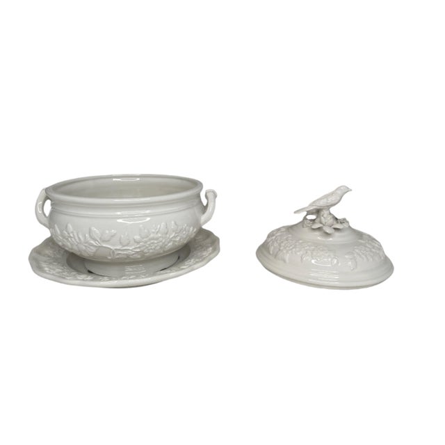 Elevate your dining experience with the Mottahedah Bird Tureen With Stand. Crafted with exquisite detail, this tureen adds...