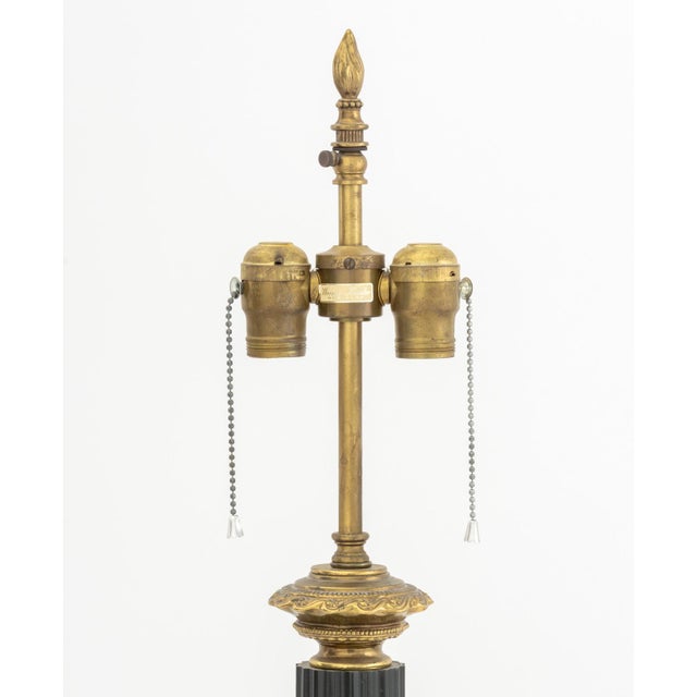 Neoclassical Style Green and Gilt Metal Columnar Table Lamp, with two bulb fittings. 34.5" H x 5.75" W x 5.75" D....