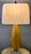A striking vintage Murano-style gold art glass table lamp featuring an elongated teardrop silhouette, sweeping twisted...