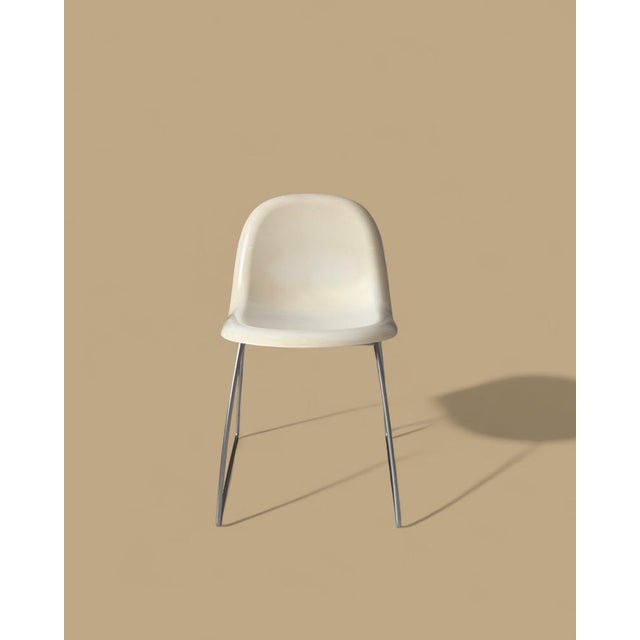 Designed by Komplot Design. One of GUBI's most innovative products, the GUBI Chair was the first furniture design to be...
