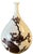 This large vintage white porcelain bottle vase was made in Japan, and showcases a classic East Asian aesthetic, defined by...