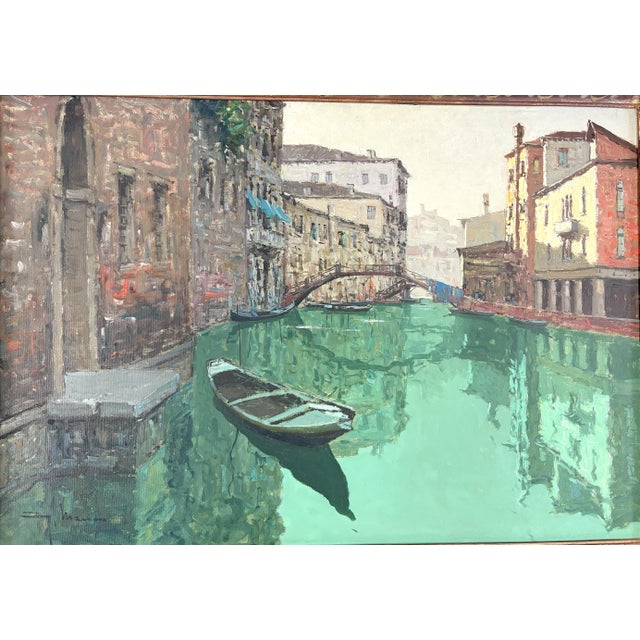 Picturesque original painting on canvas from the mid 20th century. The painting depicts a colorful Venice Canal with...