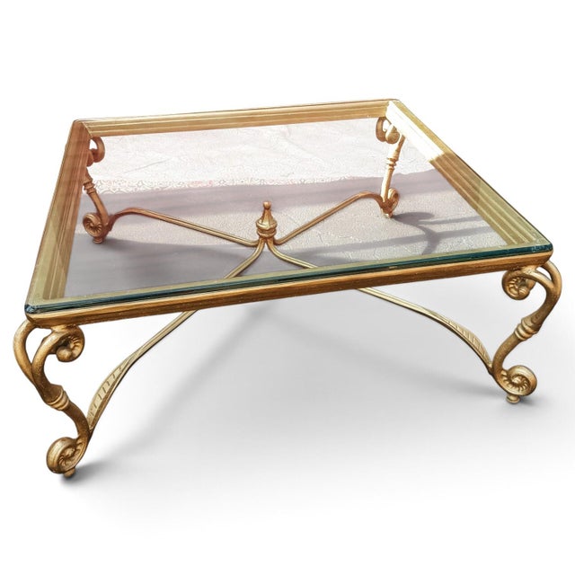 This exceptional vintage Maison Jansen coffee table seamlessly blends classical antiquity with glamorous Hollywood Regency...