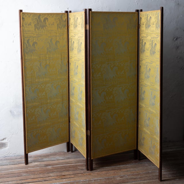 A four panel antique mahogany folding screen with a special Tibor Reich etruscan horse jacquard fabric from the 1960s....