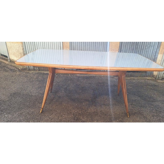 Dining Table Wooden Base, Brass Finishes, Wooden and Blue Glass Top, 1950s, in Very Good conditions. Designed 1950 to 1959