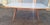 Dining Table Wooden Base, Brass Finishes, Wooden and Blue Glass Top, 1950s, in Very Good conditions. Designed 1950 to 1959