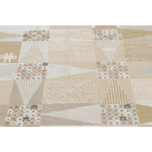 Made with hand-knotted wool and silk, this 8x10 rug is an exciting new addition to Rug & Kilim's Scandinavian rug...