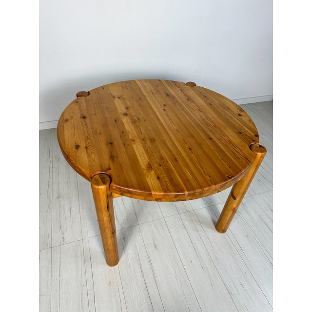 Beautiful vintage pine dining table attributed to Rainer Daumiller from the 1970s/1980s. The table features an extendable...