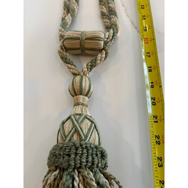 Elegant pair of high-end custom Drapery tiebacks featuring full tassels and multi strand twisted cords in soft green,...