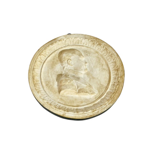 Antique French Grand Tour souvenir of Napoleon. Made in a chalkware. Has a hook for hanging and black and gold taped trim....