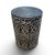 This carved African stool is a handcrafted seat or small side table made from wood and decorated with carved patterns,...