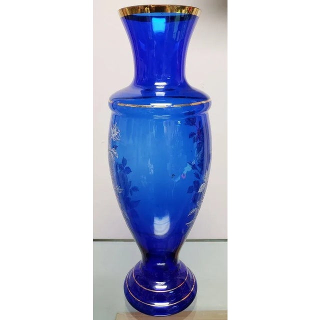 This Vintage Fenton Gilded Cobalt Glass Mary Gregory Style Roses Motif Baluster Vase measures 16 3/4" tall.