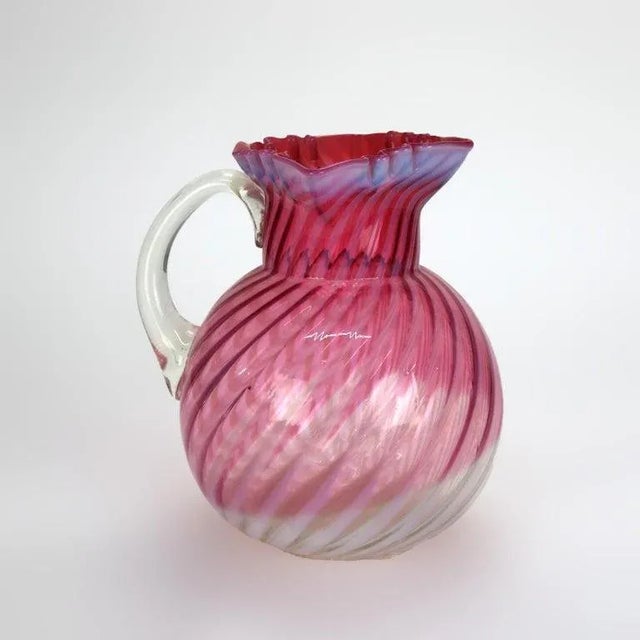 Cranberry & Opalescent Swirled Glass Juice Pitcher with Ruffled Rim 20thC Measures - 8 3/4" x 7 1/2" x 6 1/2"