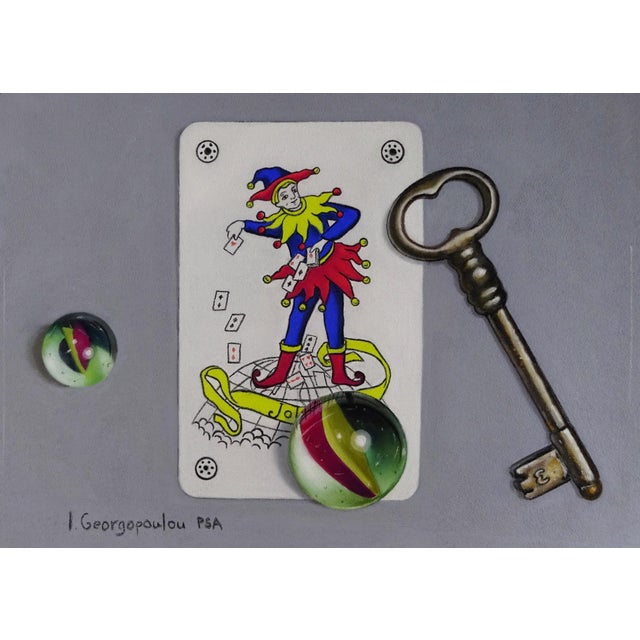 Marbles and Mischief by Irene Georgopoulou | Soft pastels on paper featuring marbles and a playing card. For Sale