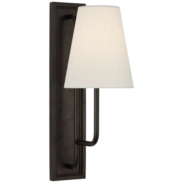 The Rui sconces by Amber Lewis offer a versatile array of lighting for bedrooms, bathrooms and living rooms alike. A...