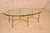 Mid-century brass coffee table with glass top from the 1960's. The glass top has beveled edges and normal wear and slight...
