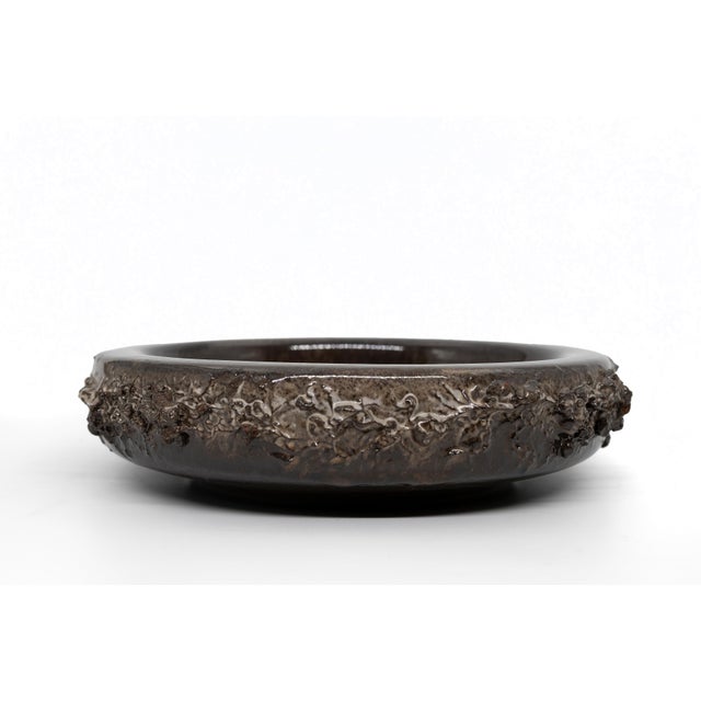 This is a striking brutalist Icelandic lava bowl produced by Glit HF. Founded in 1958 by Ragnar Kjartansson, Einar...