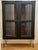 Antique Black Painted China Cabinet. Original wavy glass in both doors. Doors open and close with no sticking and close...