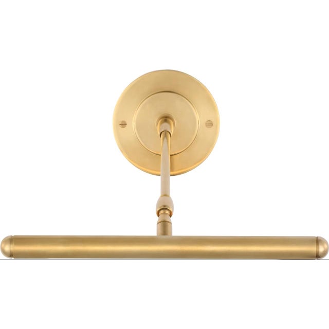 Emery 12" Picture Light in Hand-Rubbed Antique Brass Designer: Amber Lewis Finish: Hand-Rubbed Antique Brass Height: 4.5"...