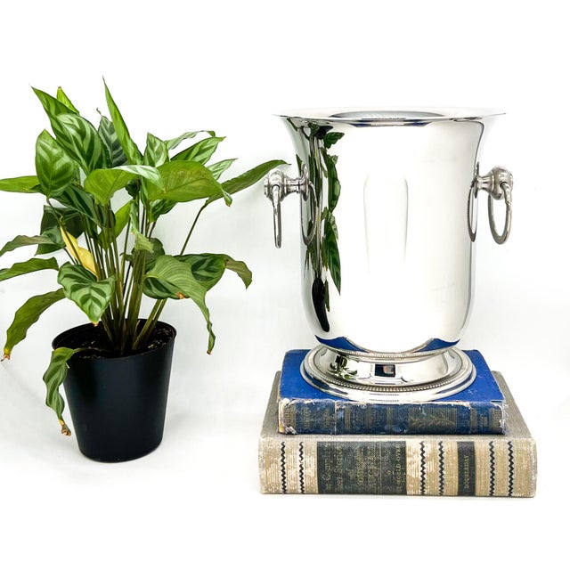 Sleek and substantial French champagne bucket by Jean Couzon, crafted in 18/10 stainless steel with a beautifully polished...