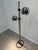 A striking vintage floor lamp by staff leuchten (west germany), dating back to the 1970s. This rare design features two...