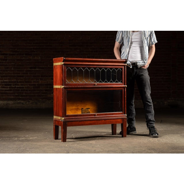 c. 1900s/1910s; The Globe-Wernicke Co. - Cincinnati, OH Antique modular faux-mahogany two-stack bookcase. In the early...