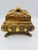 This stunning and substantial old Treasure Box features a wonderful clawfoot-design with an ornate pattern and gold gilt...