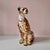 A stunning large porcelain cheetah statue, with hand painted details in a glossy finish. This is a large piece with so...