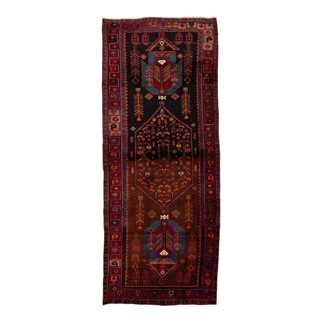 Vintage Tribal Kurdish Wool Runner Rug With Tribal Motifs & Abrash Tones For Sale