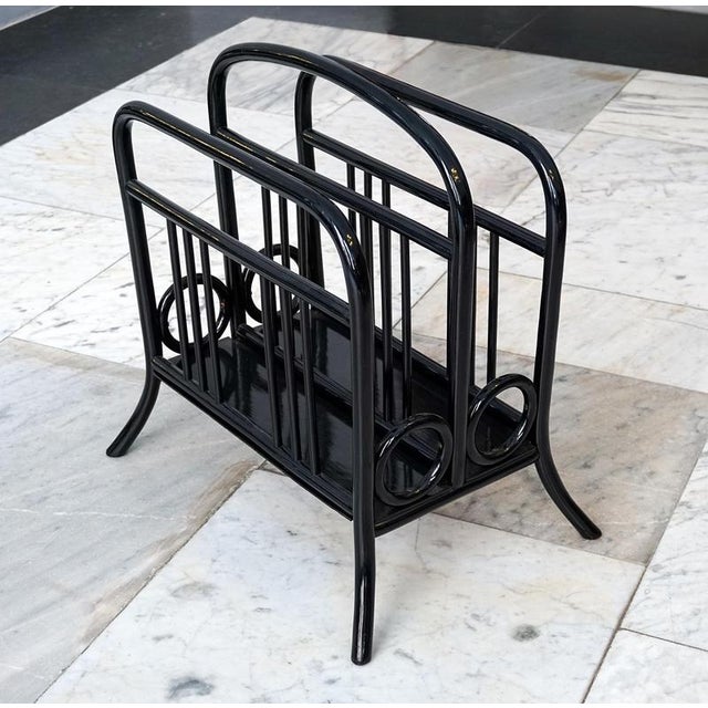 High-quality handwork, shapely bentwood, stained black This piece is attributed to the mentioned designer/maker. It has no...