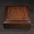 A beautifully crafted Chinese hardwood box, likely made of Huali (rosewood). This square box features a clever sliding...