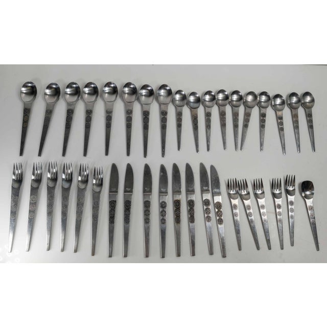 We are selling this cool Modernist style Stainless Steel flatware set. This flatware set has unique form and contains 8...