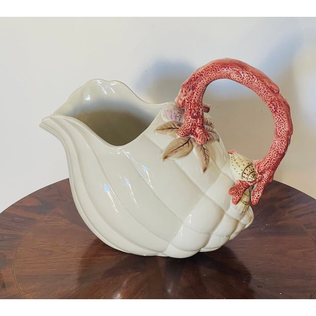 Vintage Fritz and Floyd Shell shaped pitcher ( or planter) with faux coral handle.