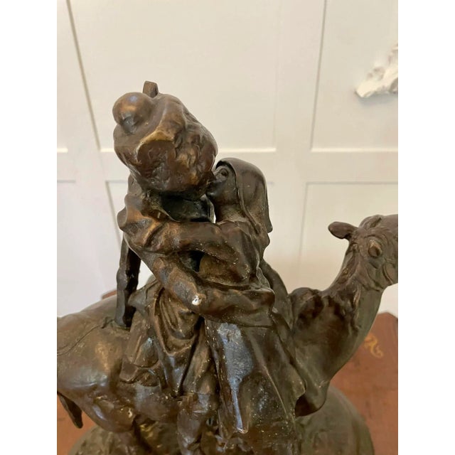 Antique victorian quality bronze figure of a cossack on horseback kissing his wife farewell with his sword and rifle at...