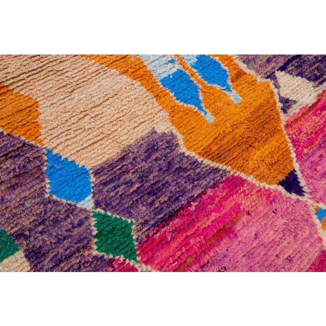Beautiful Vintage Boujad Moroccan handmade wool rug with the purple and bright multi-color field in all-over geometric...