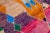 Beautiful Vintage Boujad Moroccan handmade wool rug with the purple and bright multi-color field in all-over geometric...