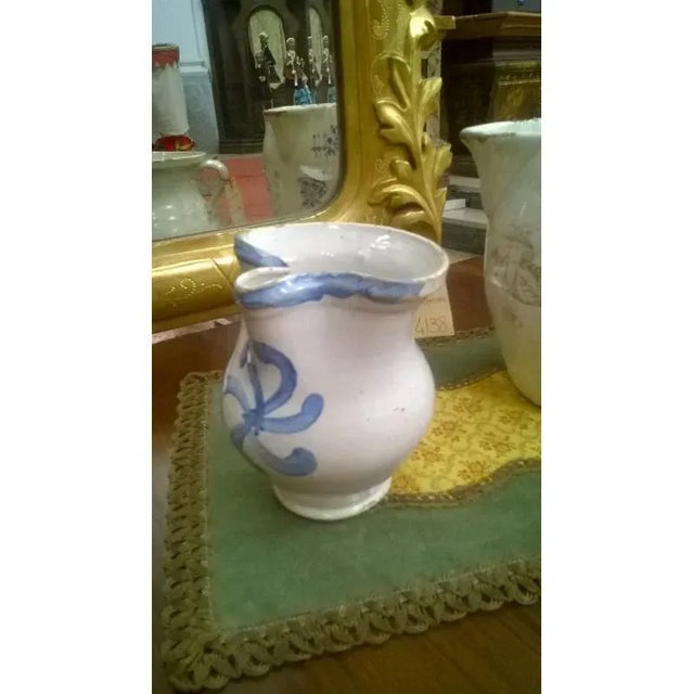 Pollenza Mc ceramic pitcher (from Pollenza Mc) from the early 1800s with blue decoration. It has some chipping but overall...