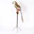 Outrageous vintage giant parrot sculpture hand crafted in metal, paint decorated and permanently perched on a metal stand...