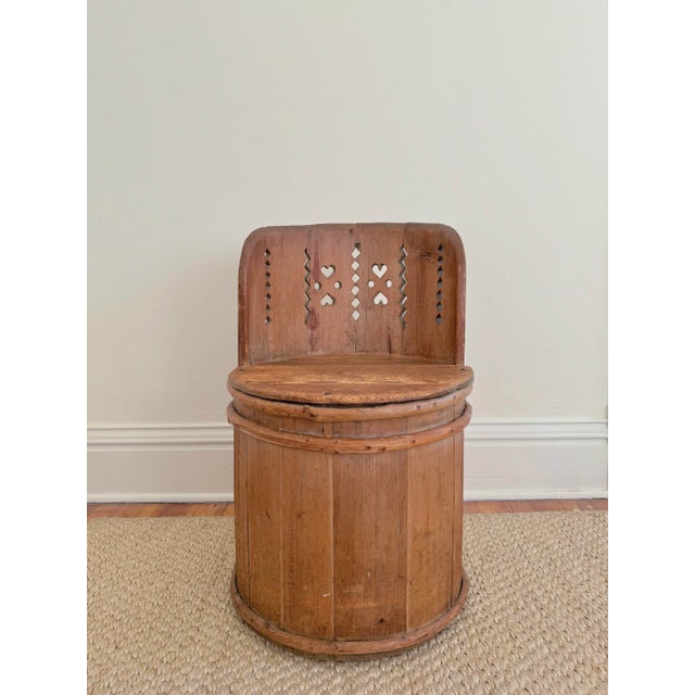 Early 19th c Swedish Kubbstol chair, in alpine pine. Carved from a tree trunk, these primitive chairs were crafted at the...