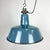 Industrial blue enamel pendant light made by Polam Wilkasy in Poland during the 1960s. White enamel inside the shade. Cast...