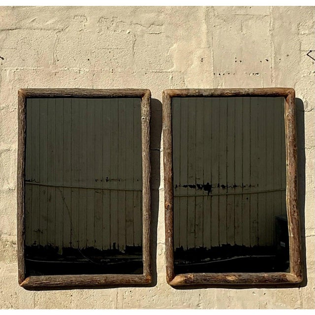This Vintage Rustic Branch Mirror - A Pair showcases organic elegance with a natural, handcrafted appeal. Each mirror is...