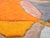 A radiant patchwork of color, held together by confident geometry. This large hand-knotted Moroccan rug divides its...